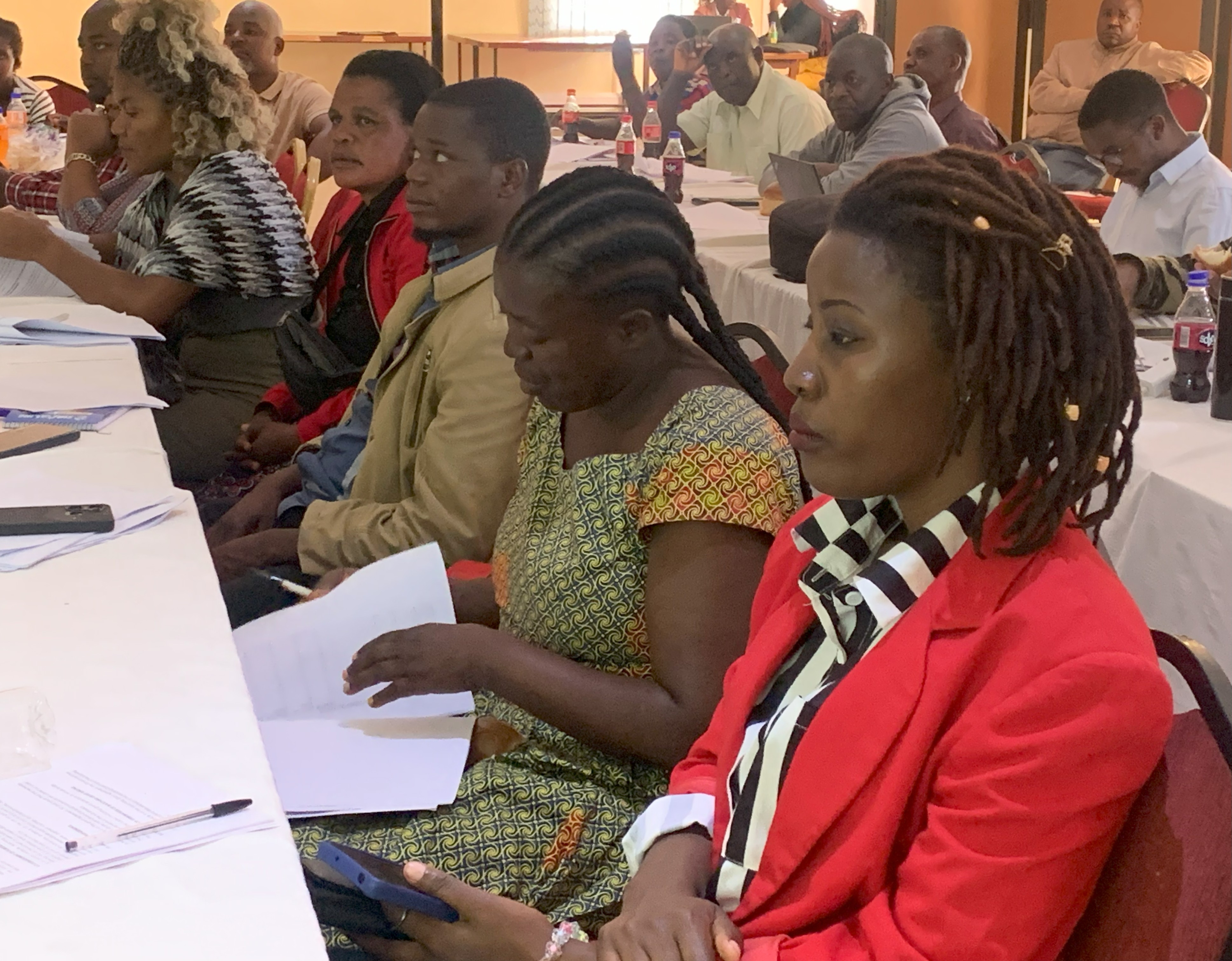 Farmers listening attentively during the training 