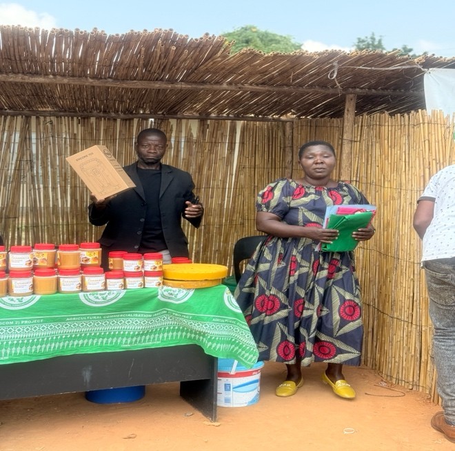 Euthini Beekepers Secretary and Marketing Committee Chair Exhibiting Honey at fair